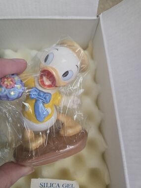 Disney Yellow & Blue Baby Duck Figurine with Flower